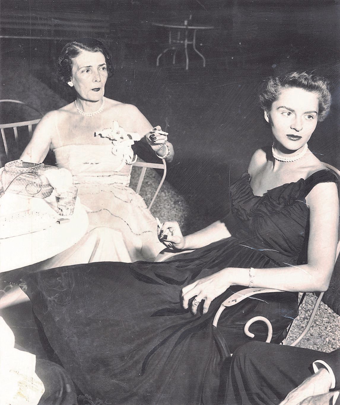 Ginevra King Pirie in white and Mrs. J. Russell Forgan, c. 1954 at Shoreacres in Lake Bluff.