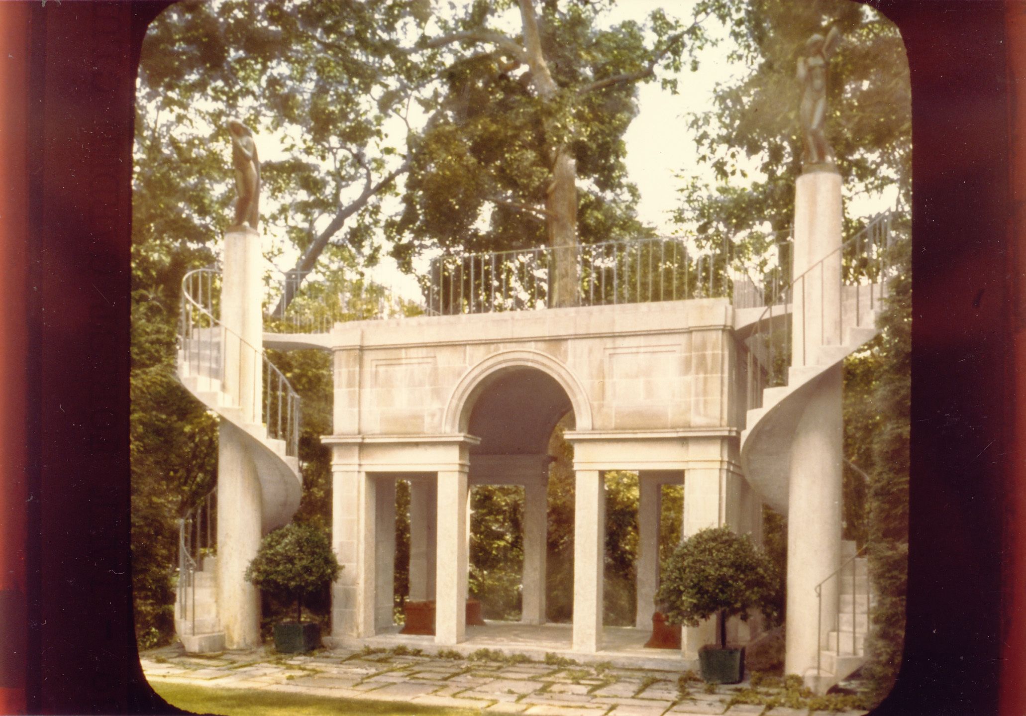 Belvedere at the Centaurs estate. The Palladian structure is of limestone and pink granite. The nymphs were designed by American sculptor, John Storr. The twirling staircase recalls the stairs in an English gentleman’s library.