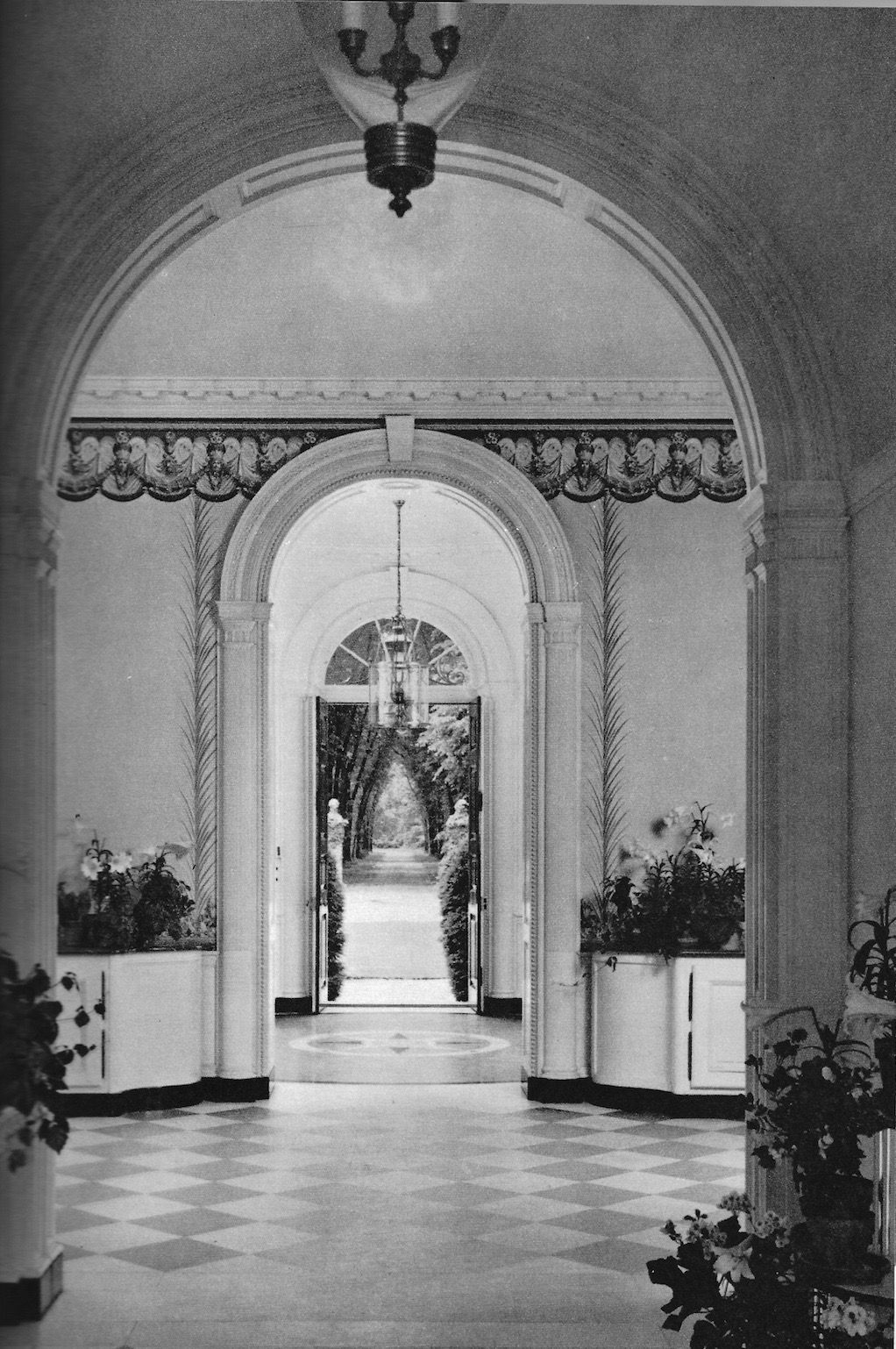 Entry Hall looking out the front door of the Lester and Leola Armour house. Image Source: Courtesy of Robert and Leola A. Macdonald.