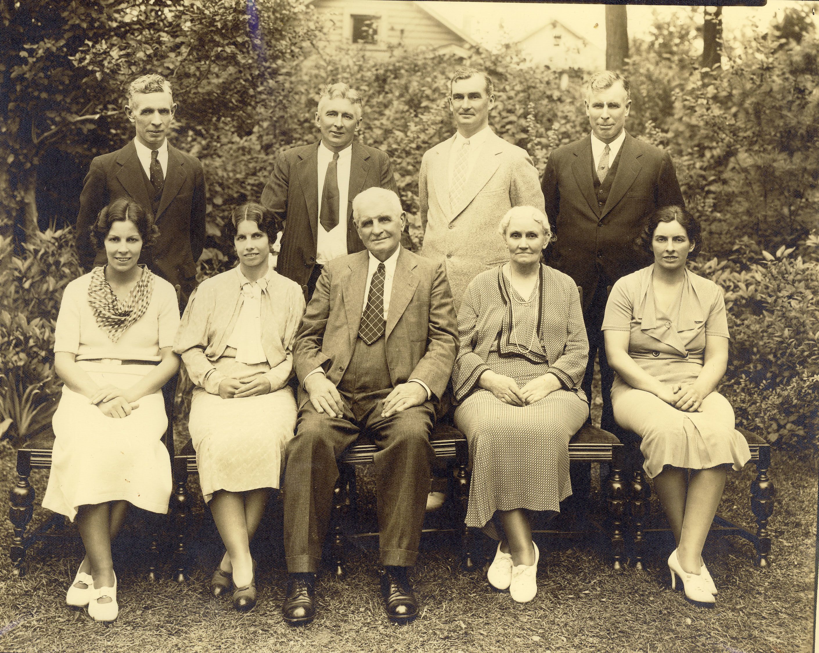 Gordon L. Kelley's grandparents, Alex and Martha Kelley, surrounded by their seven children at their 50th wedding anniversary in 1935. Gordon L.'s father, Gordon J. Kelley, is standing in the top row at right.