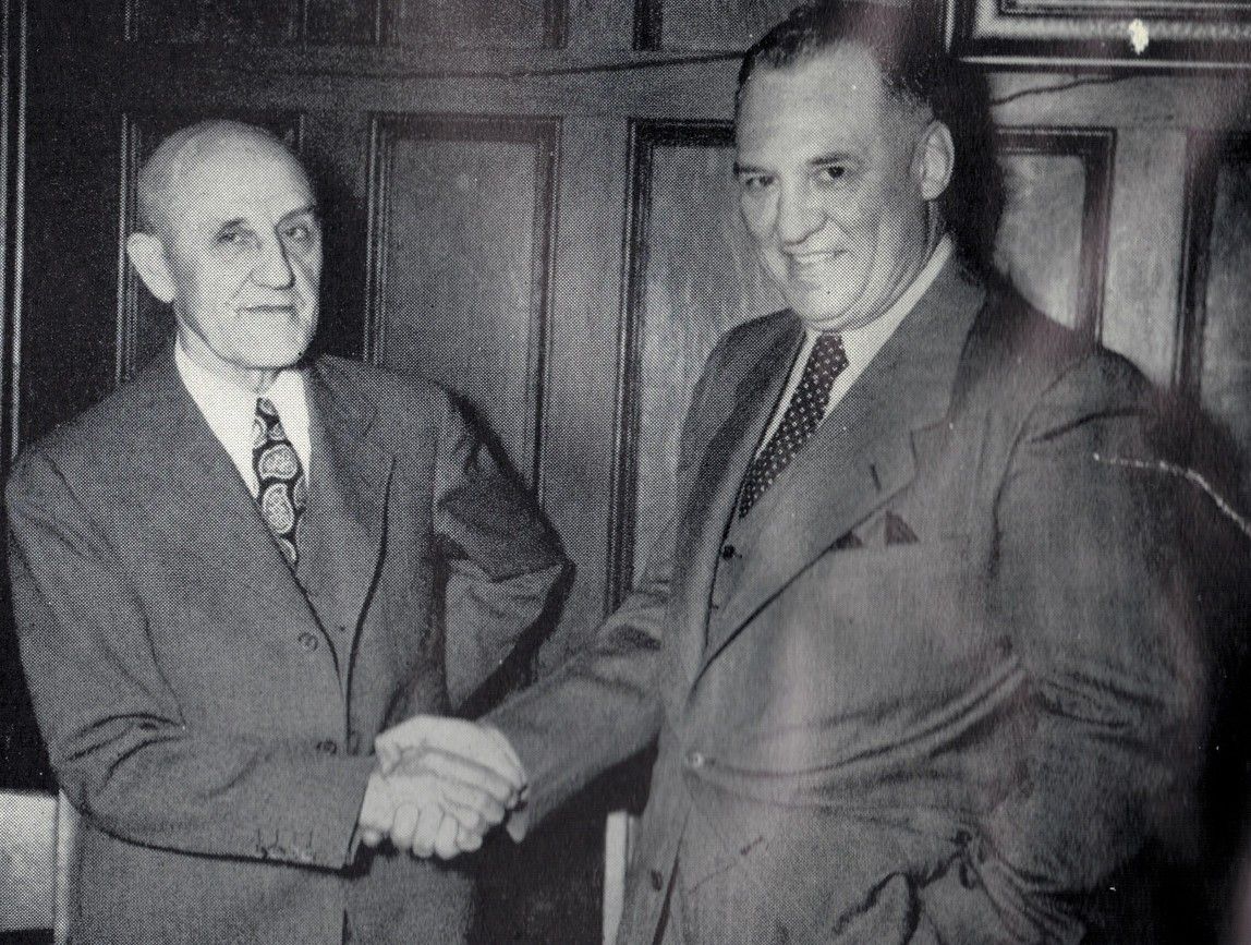 Ralph Jones with University of Illinois and Chicago Bears football great “Red” Grange, at the 1947 Lake Forest College football banquet. From the 1948 Forester yearbook.
