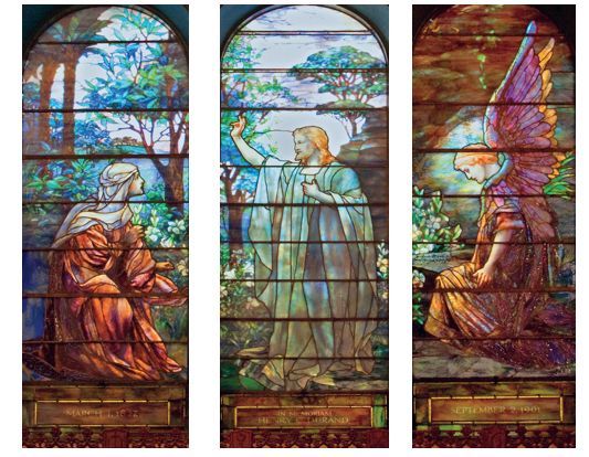 Stained glass windows at the front of the church, installed 1901.