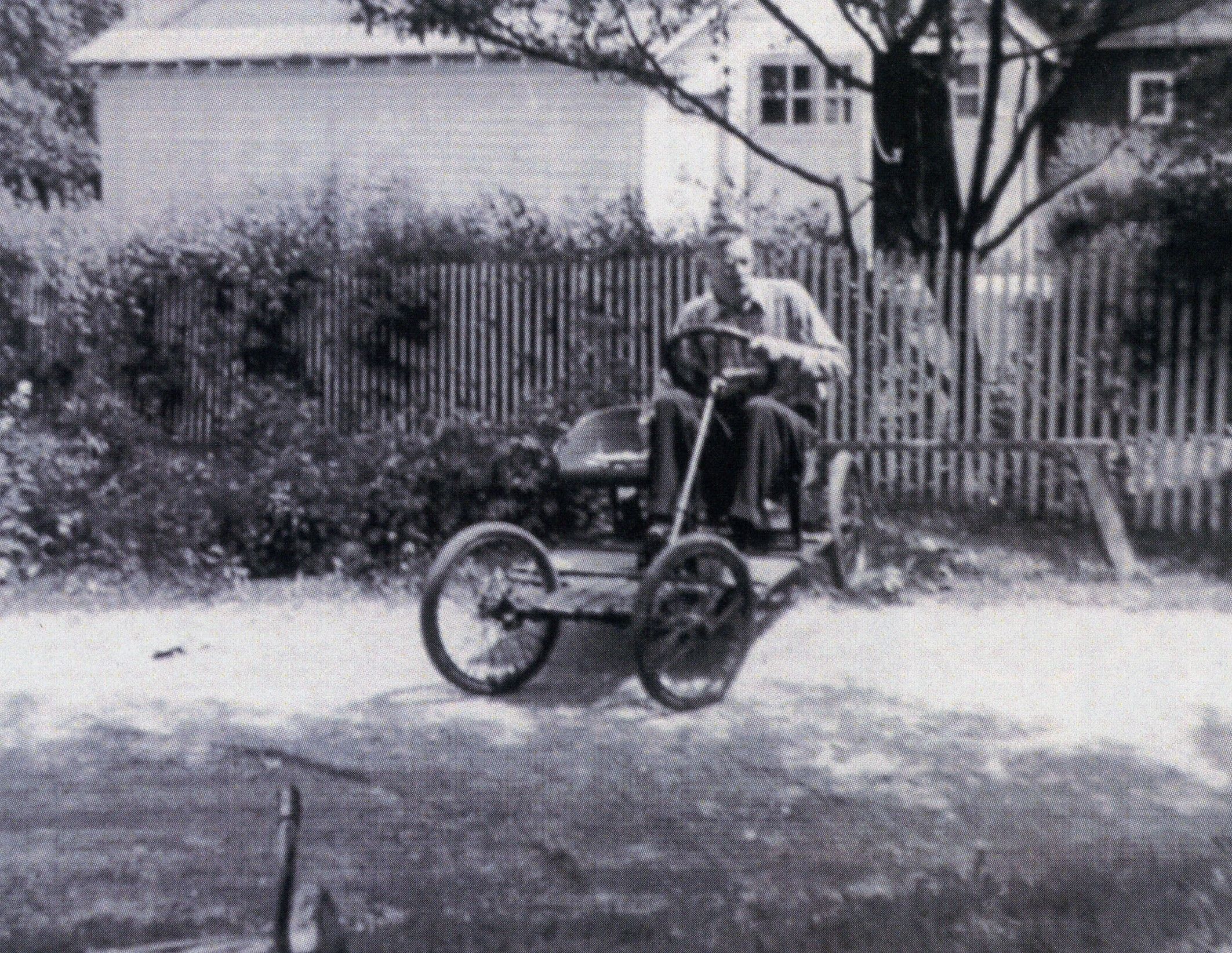Bill Knauz on his gasoline engine powered ""buckboard,"" c. 1942.