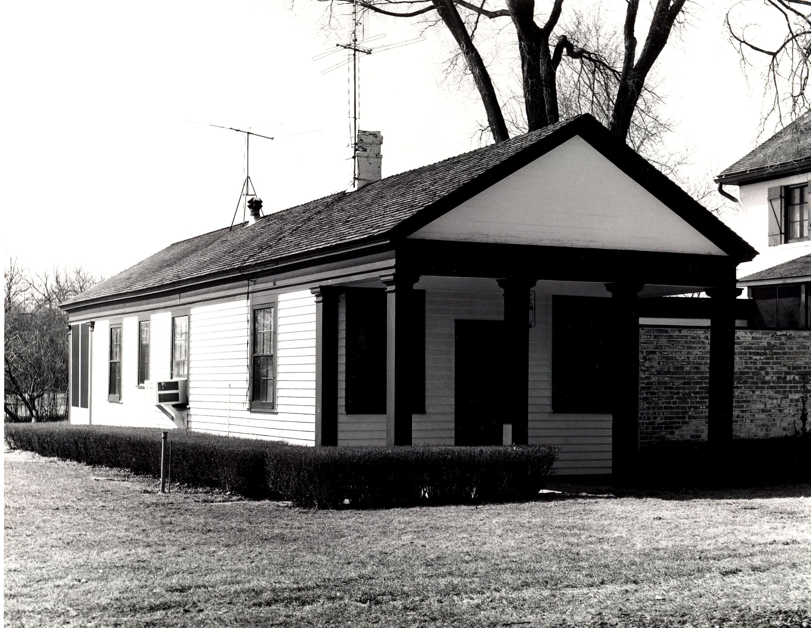Mill Road Farm Golf Club clubhouse and caddy shack. These two buildings have since been connected to form one residence, and marks from the cleats of golfers can still be seen on the floor.