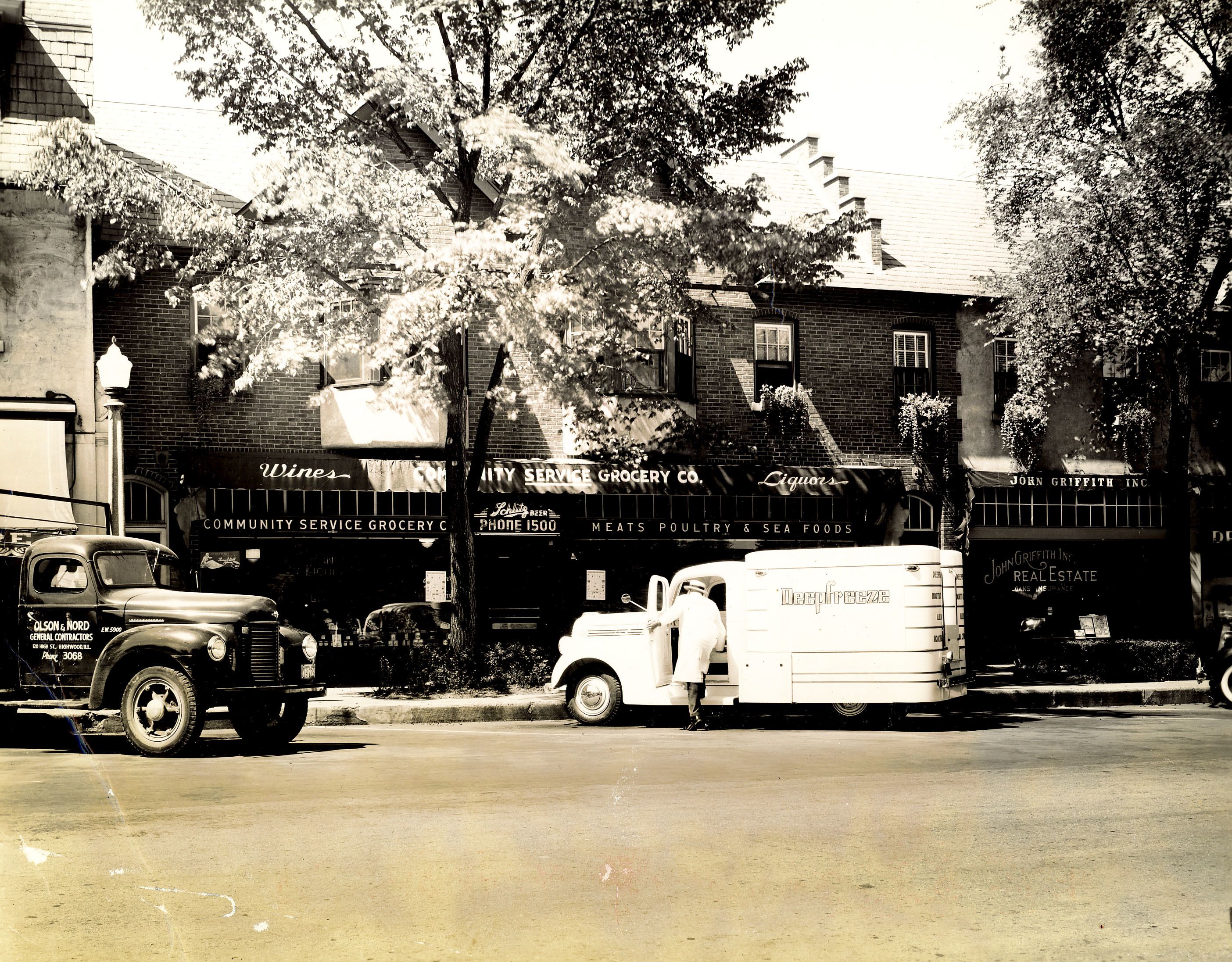 Deepfreeze initiated a frozen food home delivery service. Local residents Sam Rogondino and Thomas Christophero drove the trucks, shown here in downtown Lake Forest.