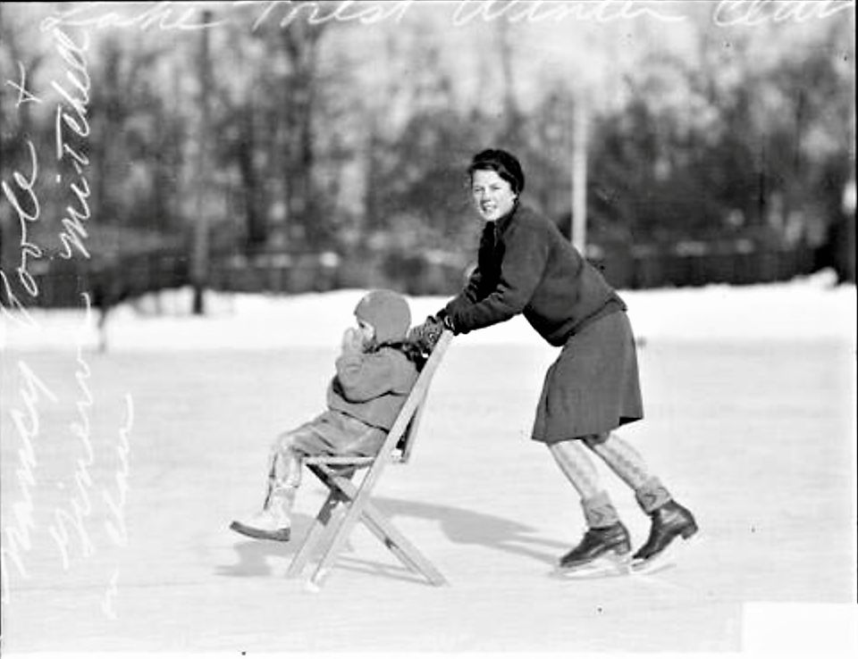 Nancy Poole pushing Ginevra Mitchell at the Winter Club. Image Source: Chicago Daily News.